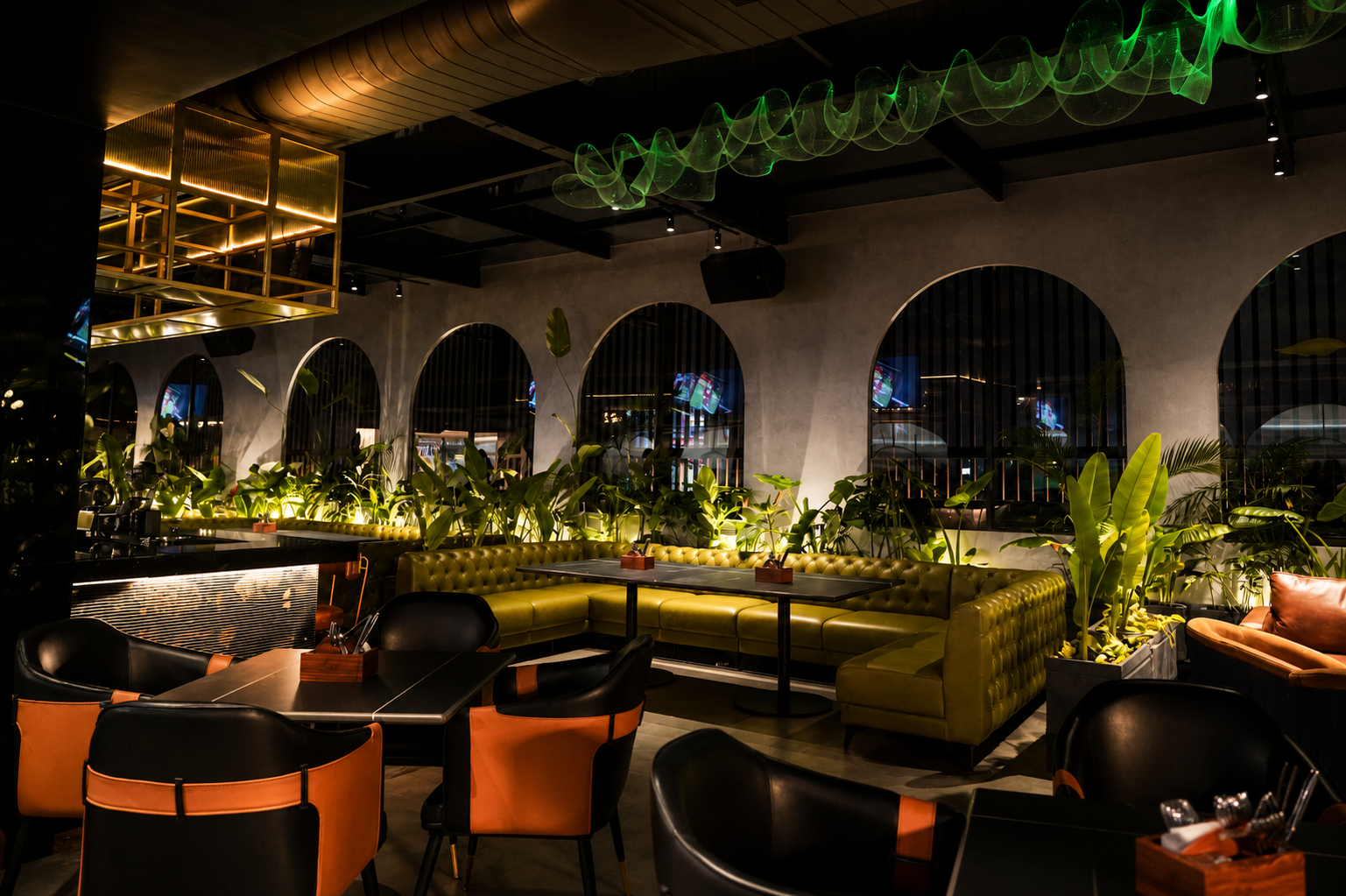 Underdoggs Raipur nightlife lounge interior with contemporary seating and greenery